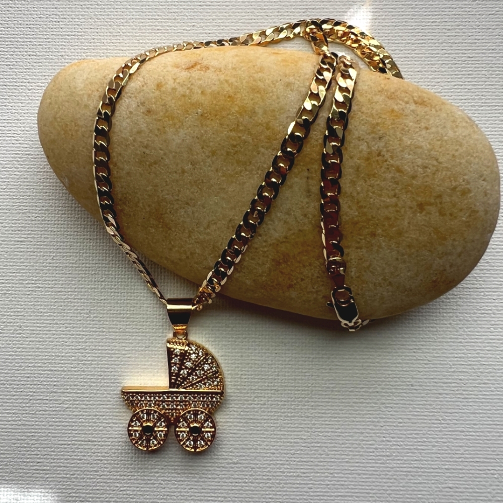 4k Laminated Gold Cuban link chain with baby stroller charm.